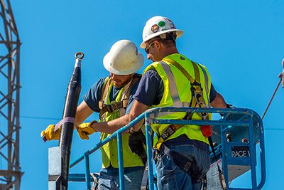 High Voltage Cale prep by two linemen