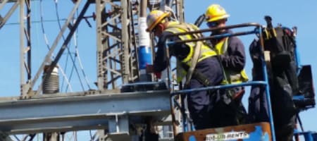 Two Workers Preparing Underground Cable